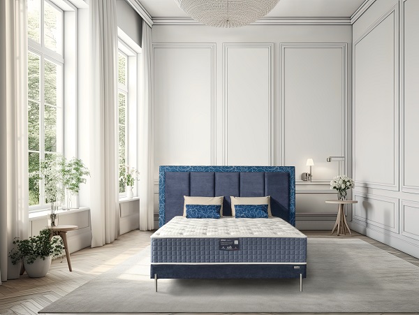 spacious white bedroom with a king-sized bed and a large window. Generative AI - ©Literie Confort